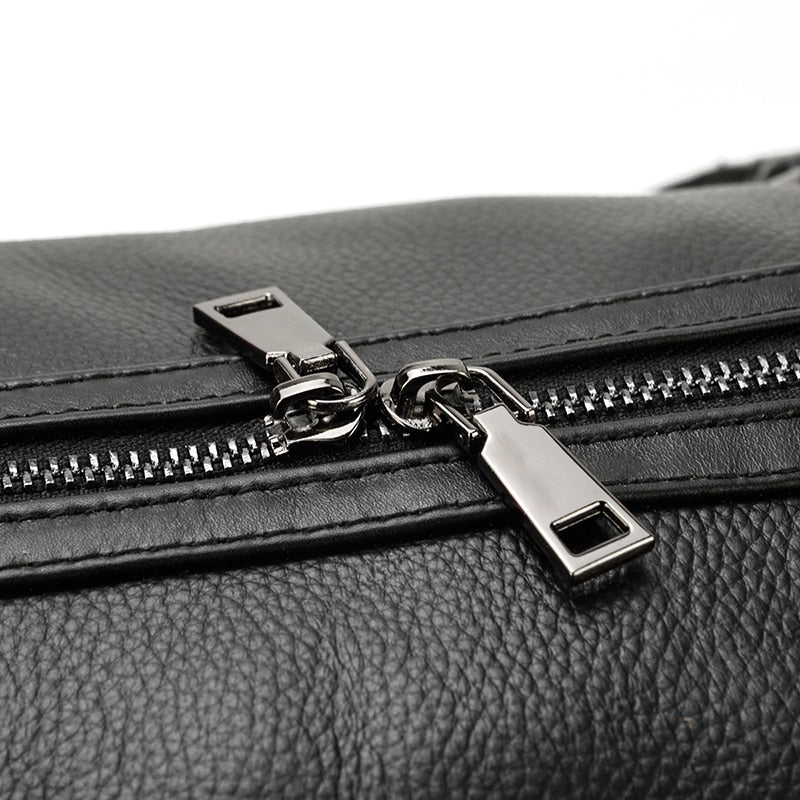 BACKPACK | BOLSO DE VIAJE NEGRO DE CUERO