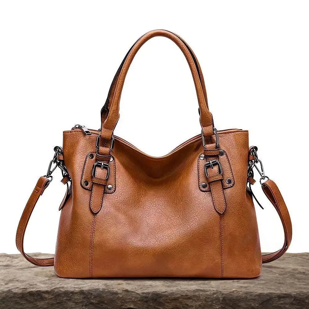 BOLSO CLASICO CON BROCHES DE PIEL CUERO