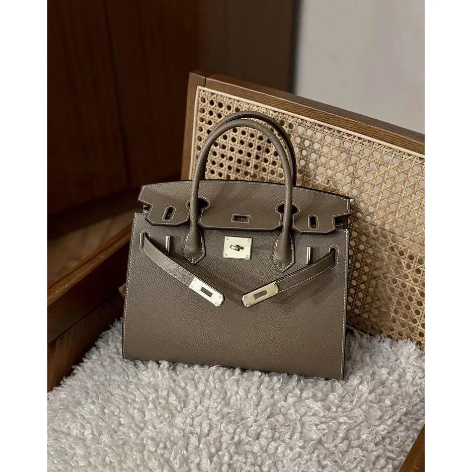 KINGDOWN | BOLSO DE CUERO CON BROCHE DORADO
